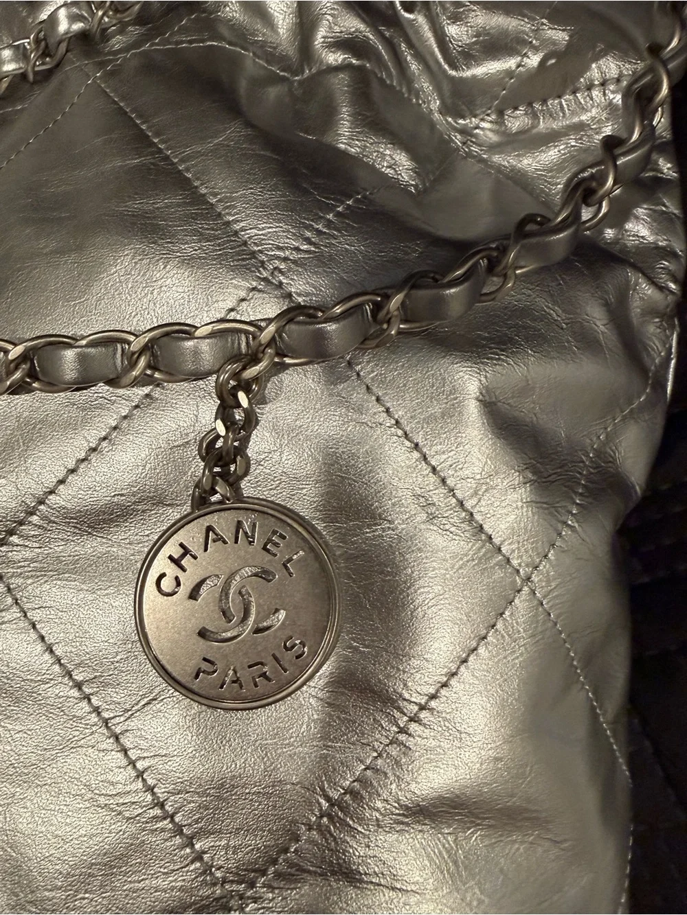 Chanel 22 in Metallic silver leather with silver hardware